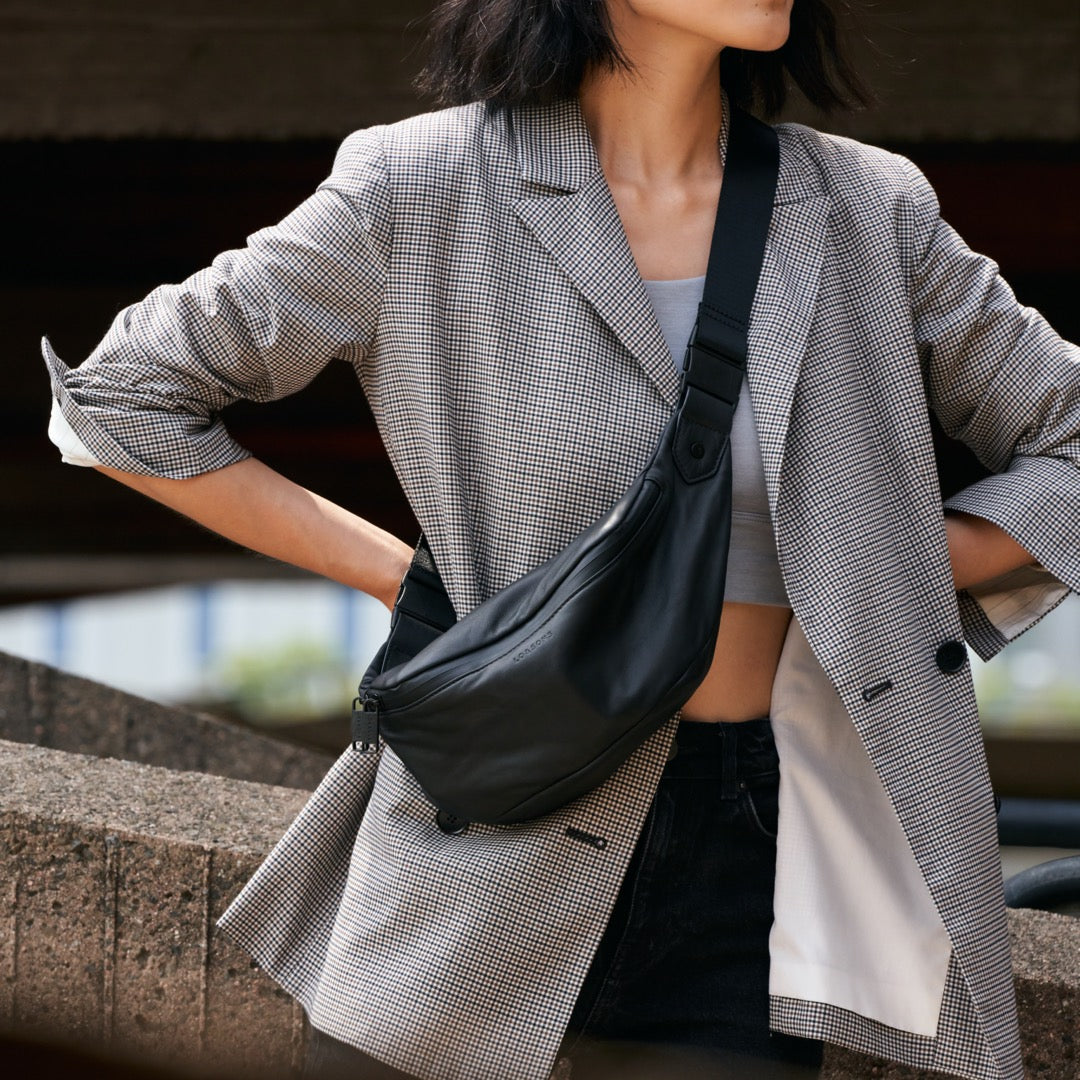 woman wearing Bond leather crossbody bag as a sling bag