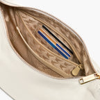 interior view of the card and zipper pockets of the Aoyama Leather in Ivory