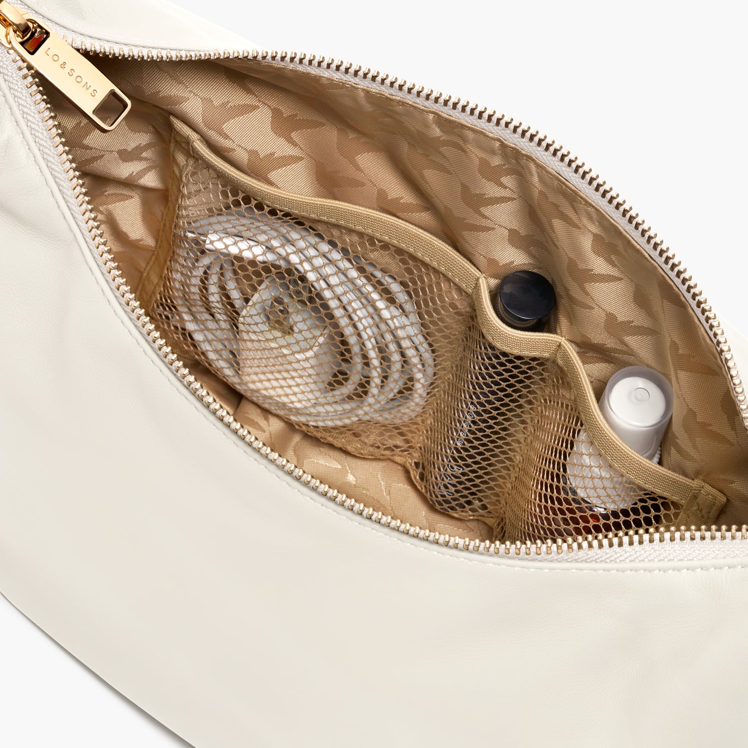 interior view of the mesh pockets of the Aoyama Leather in Ivory