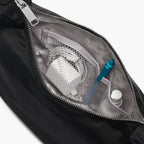 view of interior mesh pockets of Aoyama Nylon in black with gunmetal hardware