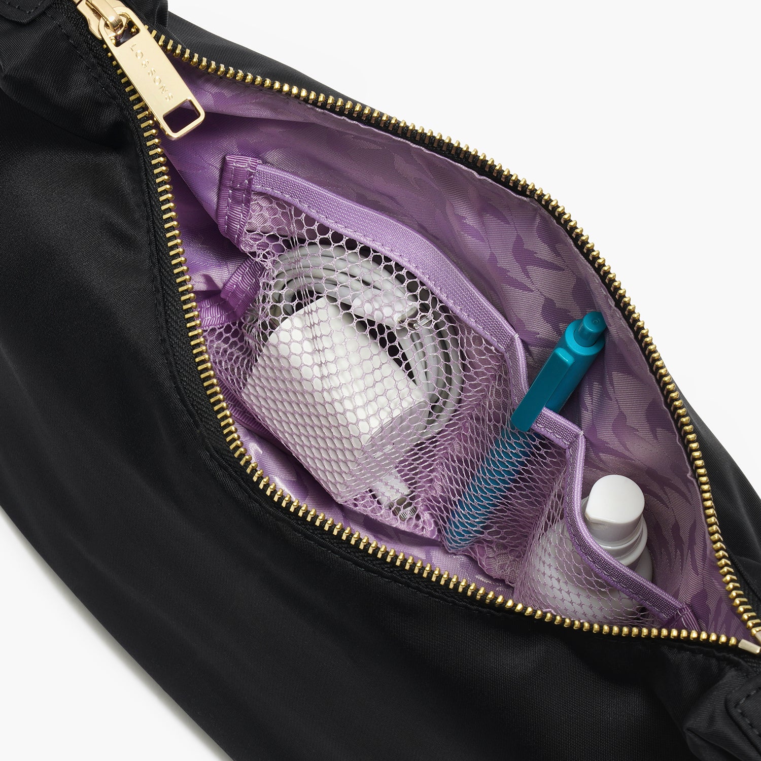interior view of mesh pockets in Aoyama Nylon in Black with Gold Hardware and Lavender Lining