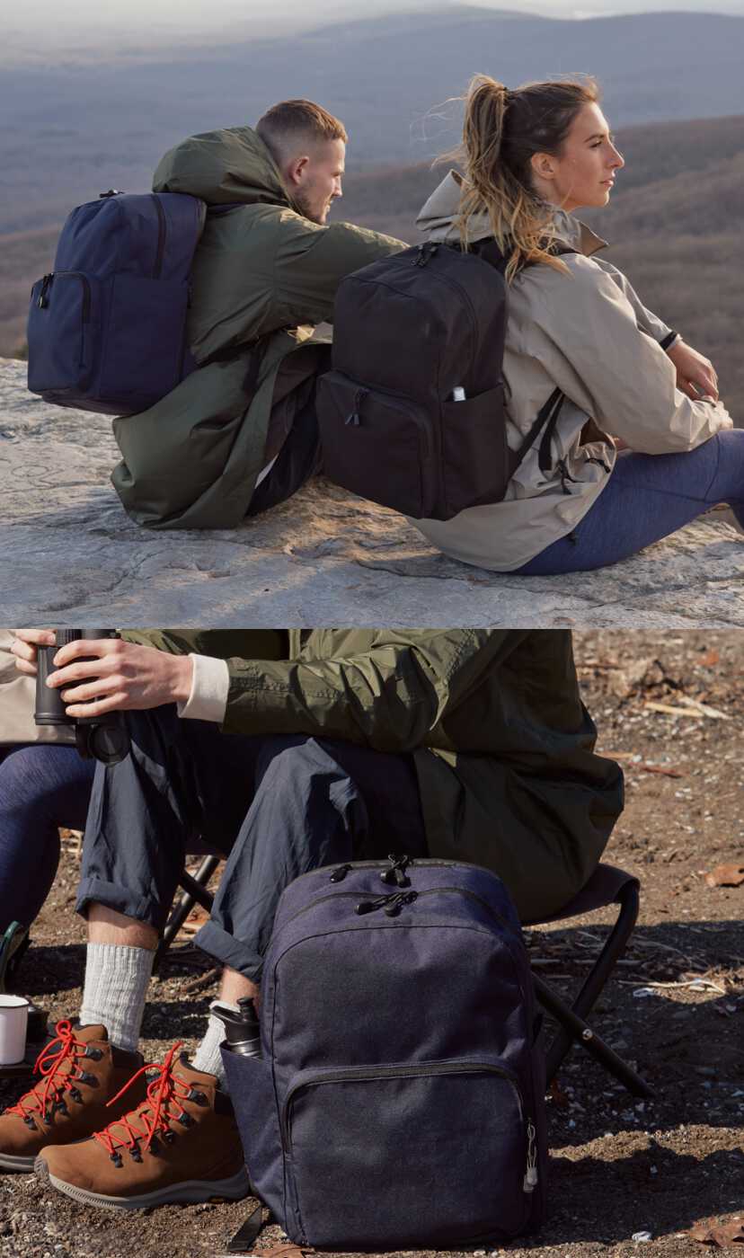 a man and a woman use their Hanover Deluxe 2 backpacks on a hiking trip