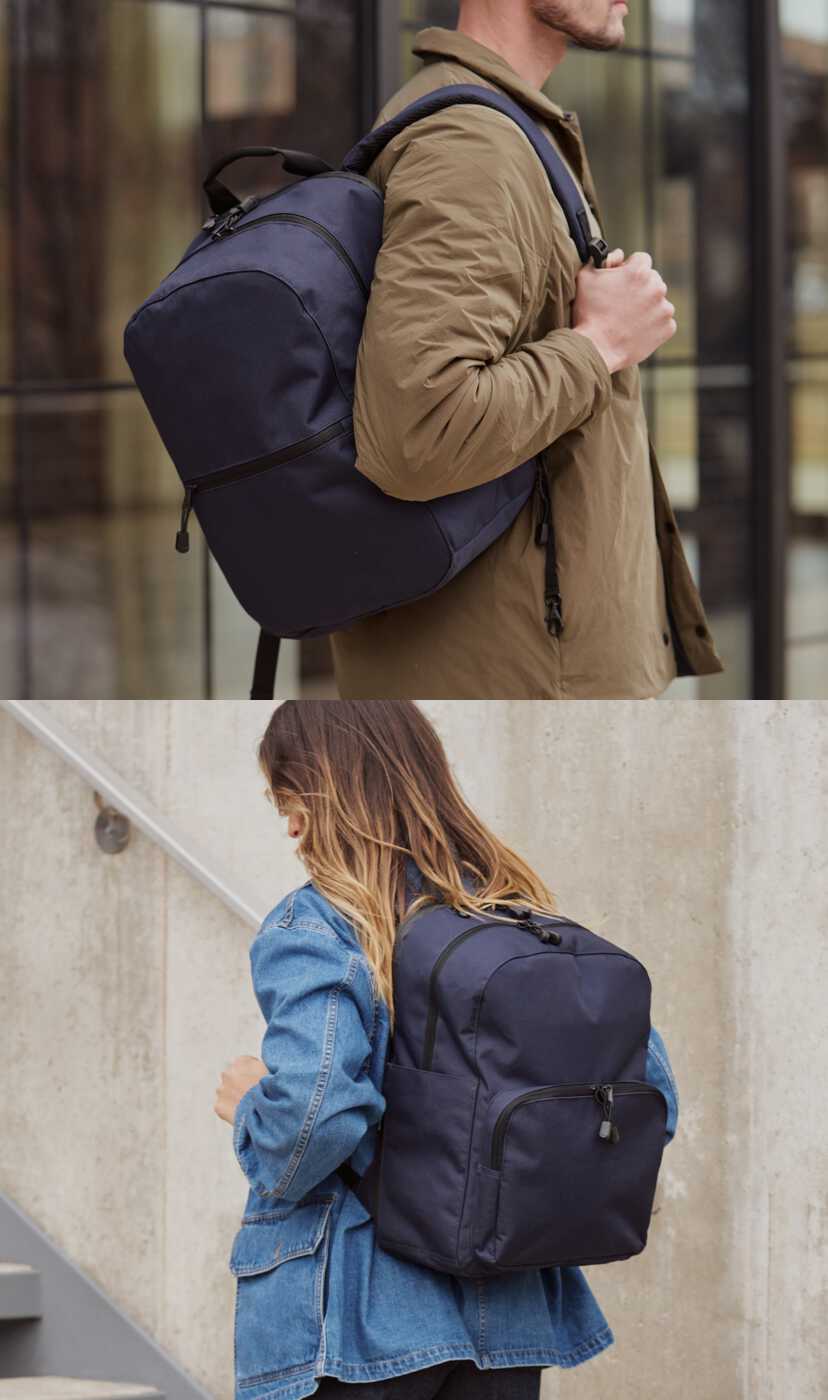 a man and woman using their backpacks in a city