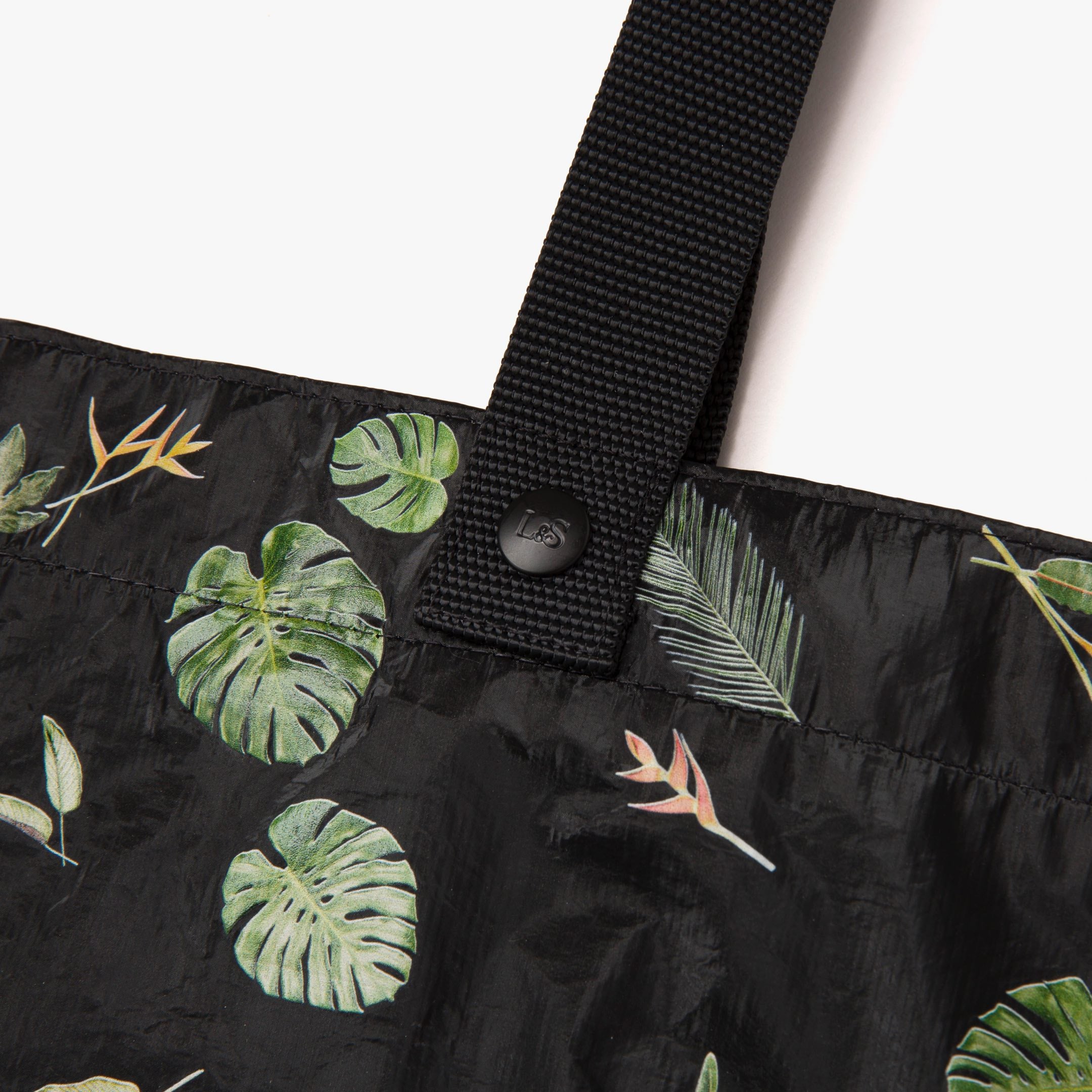 Lo and Sons Del Mar Packable Tote Large Leaf Print closeup handle