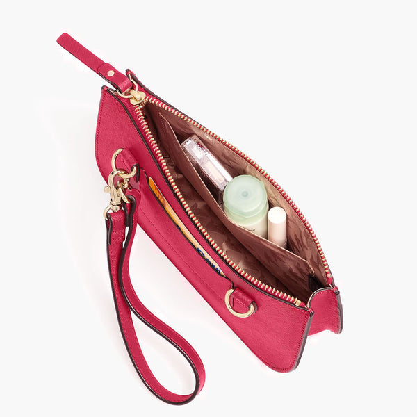blush pink purse with burgundy interior from Coach